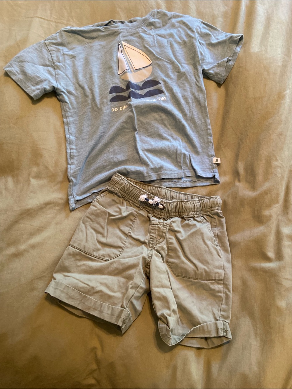 Easy Peasy 5T sailboat shirt and Cat & Jack Green 4T shorts